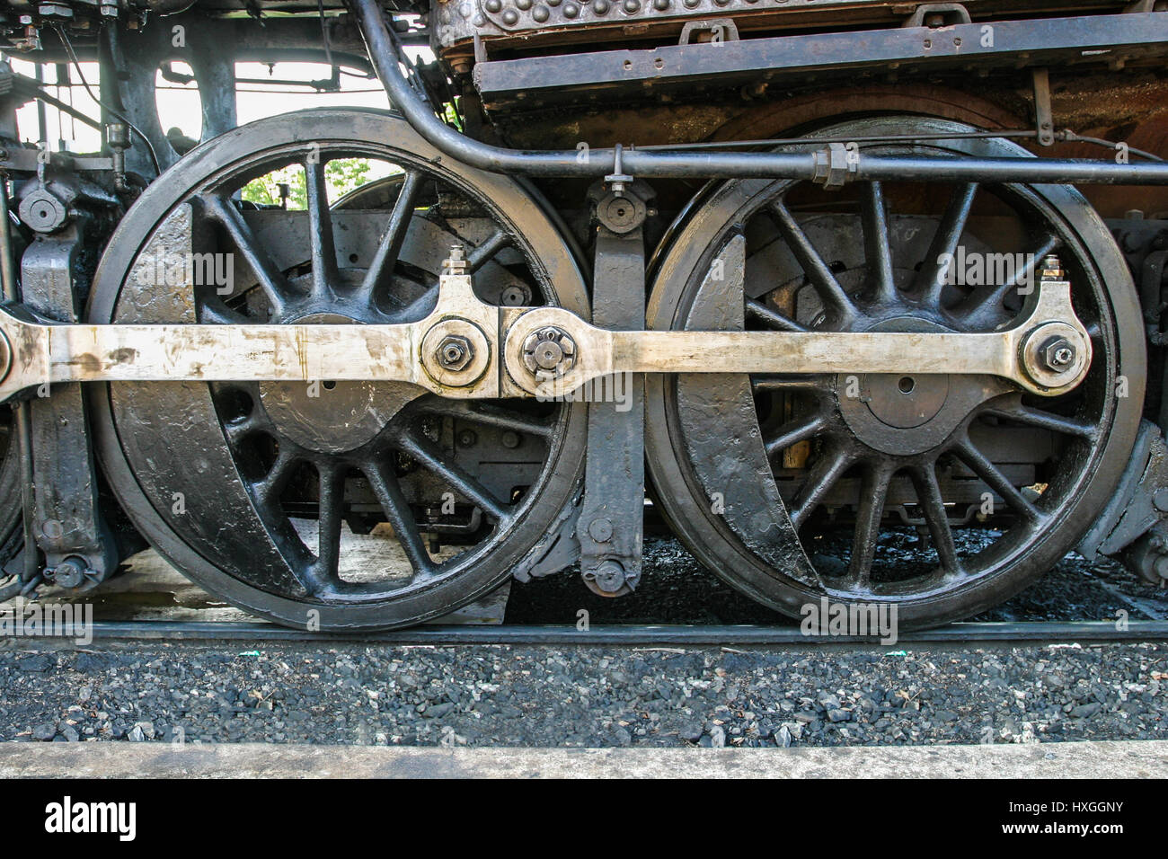 Close-up view of locomotive coupling rods. Stock Photo