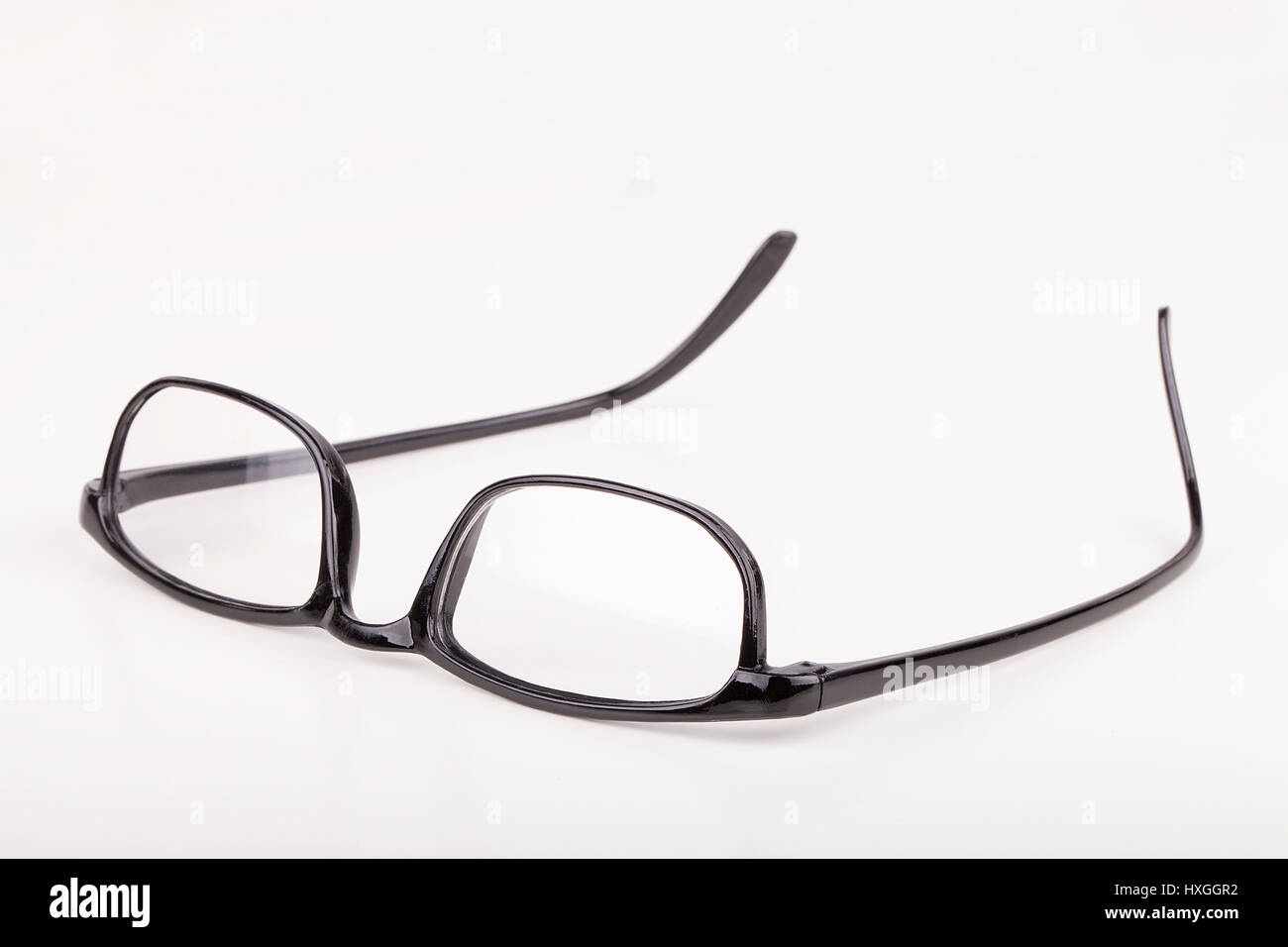 Reading glasses isolated on white background Stock Photo - Alamy