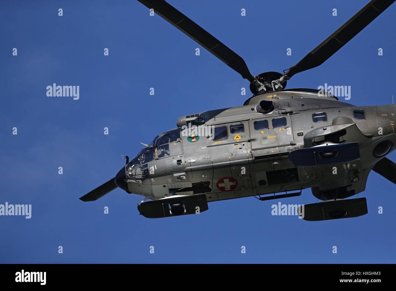 Locarno Airport,Ticino, Switzerland; March 27, 2017: a Swiss Air Force military Eurocopter AS332 Super Puma helicopter used in SAR operations with ski Stock Photo