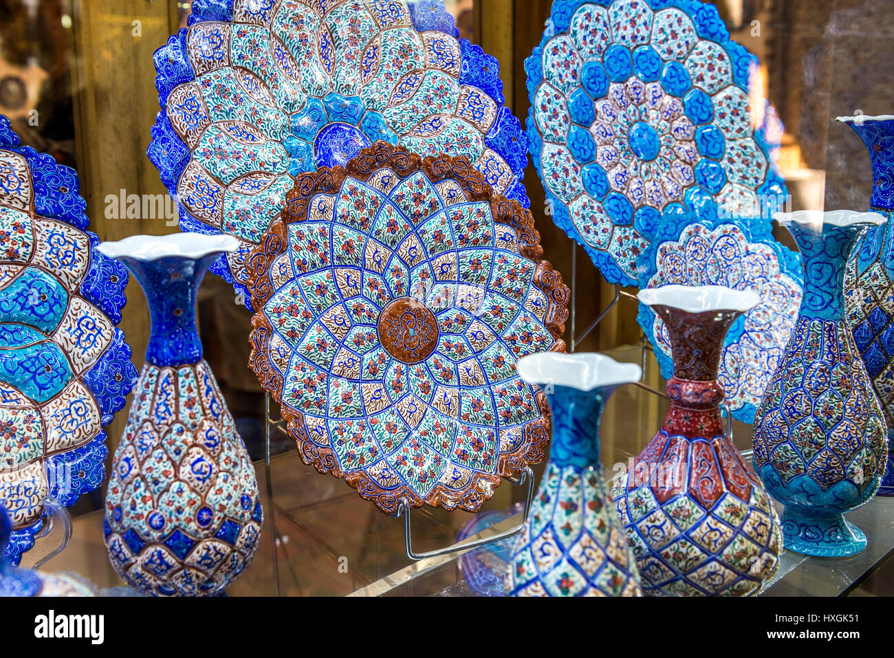 Persian style plates and vases on Bazaar of Isfahan next to Naqsh-e Jahan Square (Imam Square, formlerly Shah Square) in centre of Isfahan in Iran Stock Photo