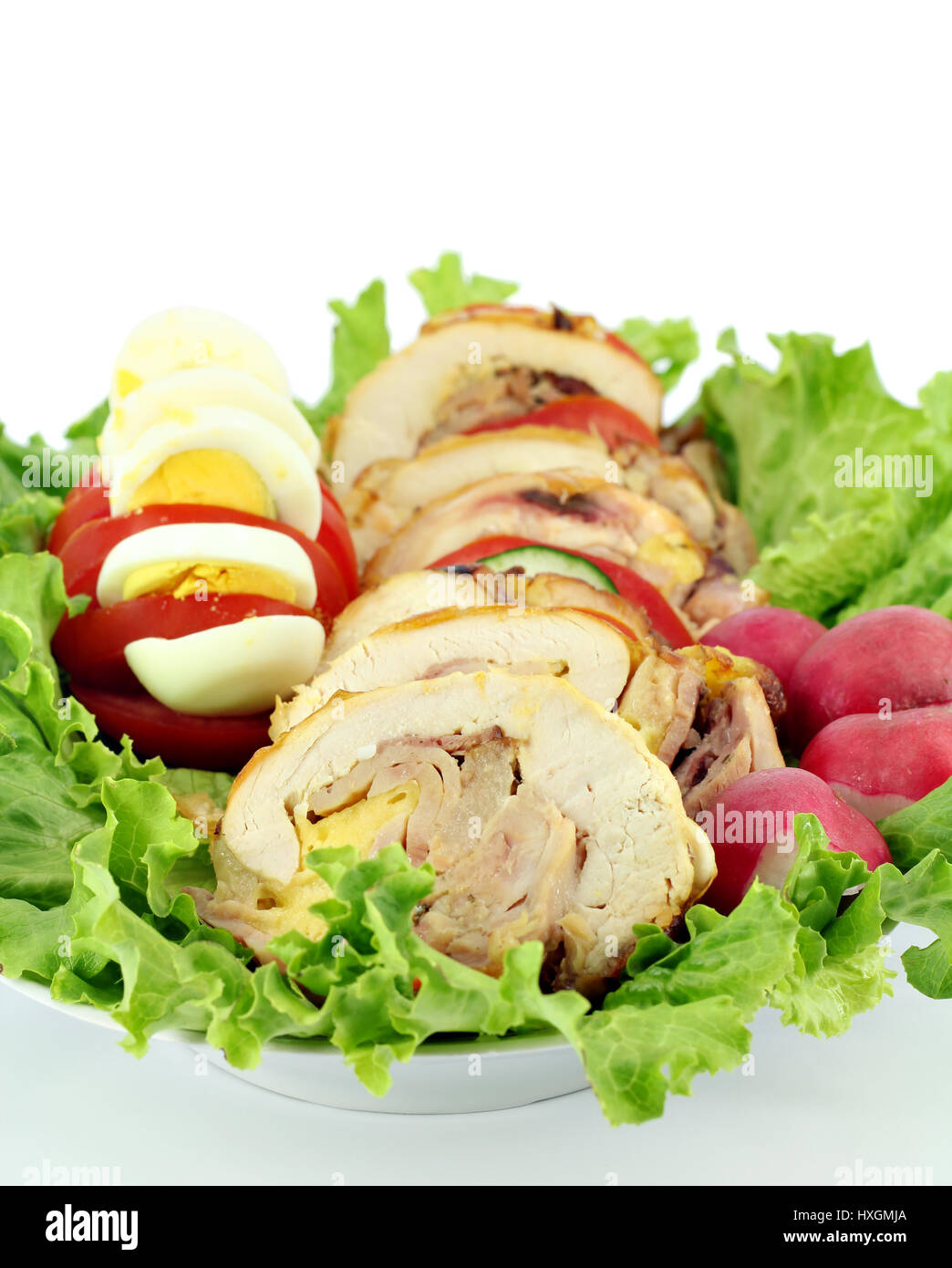 rolled and stuffed chicken meat Stock Photo