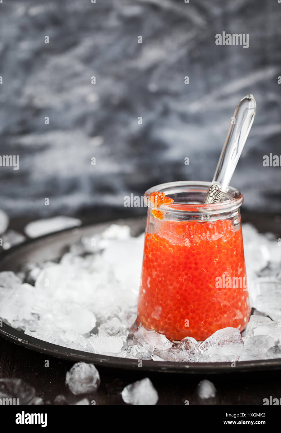 Jar full of delicious red caviar Stock Photo
