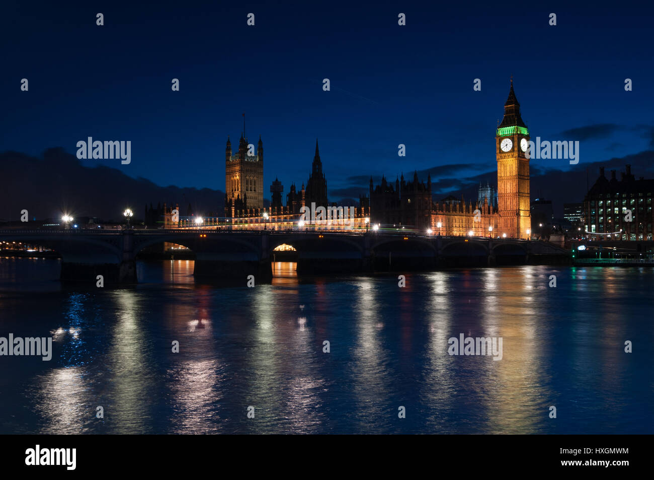 Palace of Westminster, Big Ben, Westminster bridge and the Thames river at dusk, London, United Kingdom Stock Photo