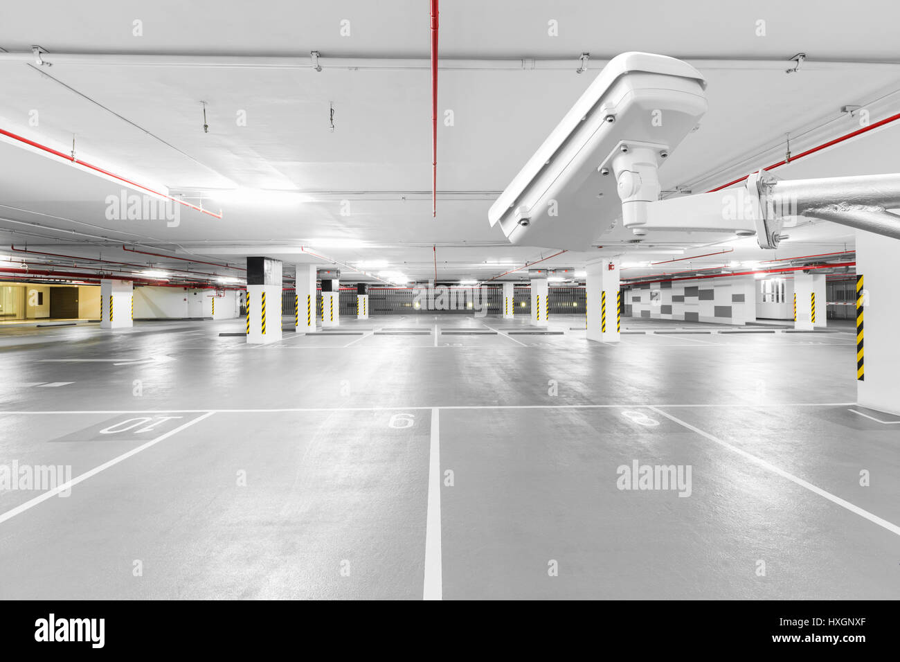 CCTV camera in underground parking garage Stock Photo Alamy