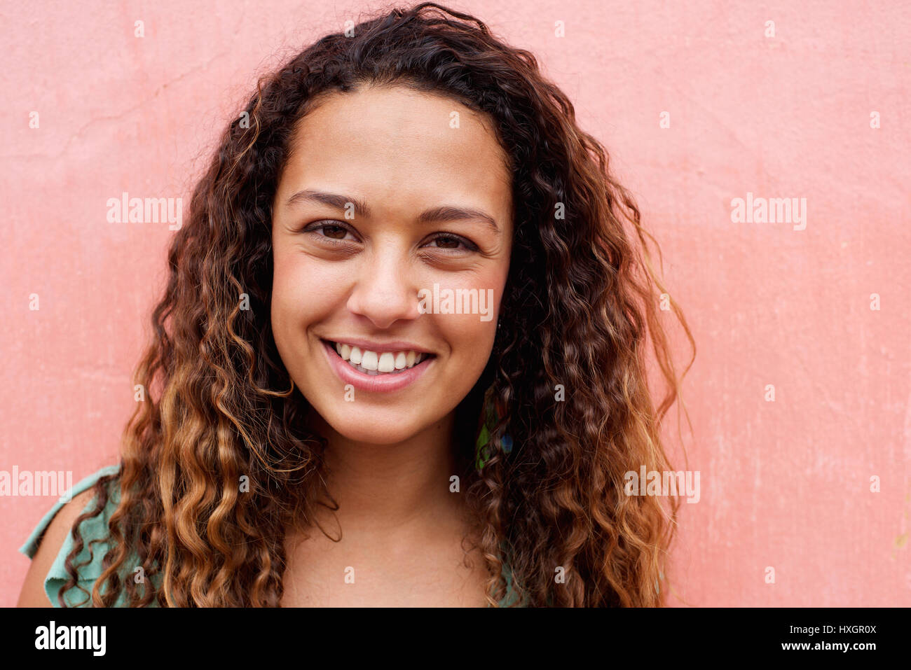 Close up portrait of a beautiful young woman with curly hair Stock ...