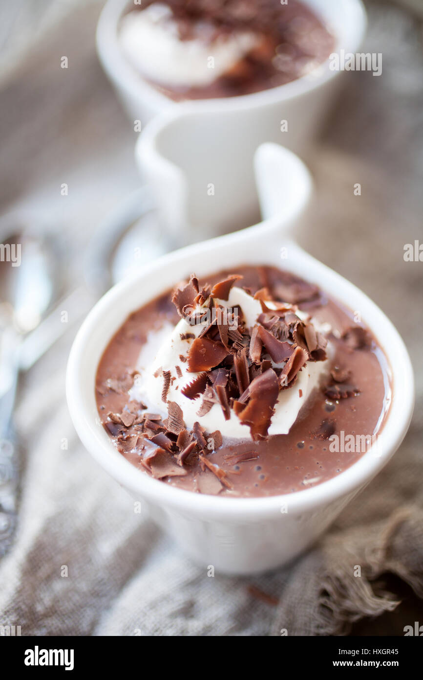 Chocolate pudding with whipped cream and chocolate Stock Photo Alamy