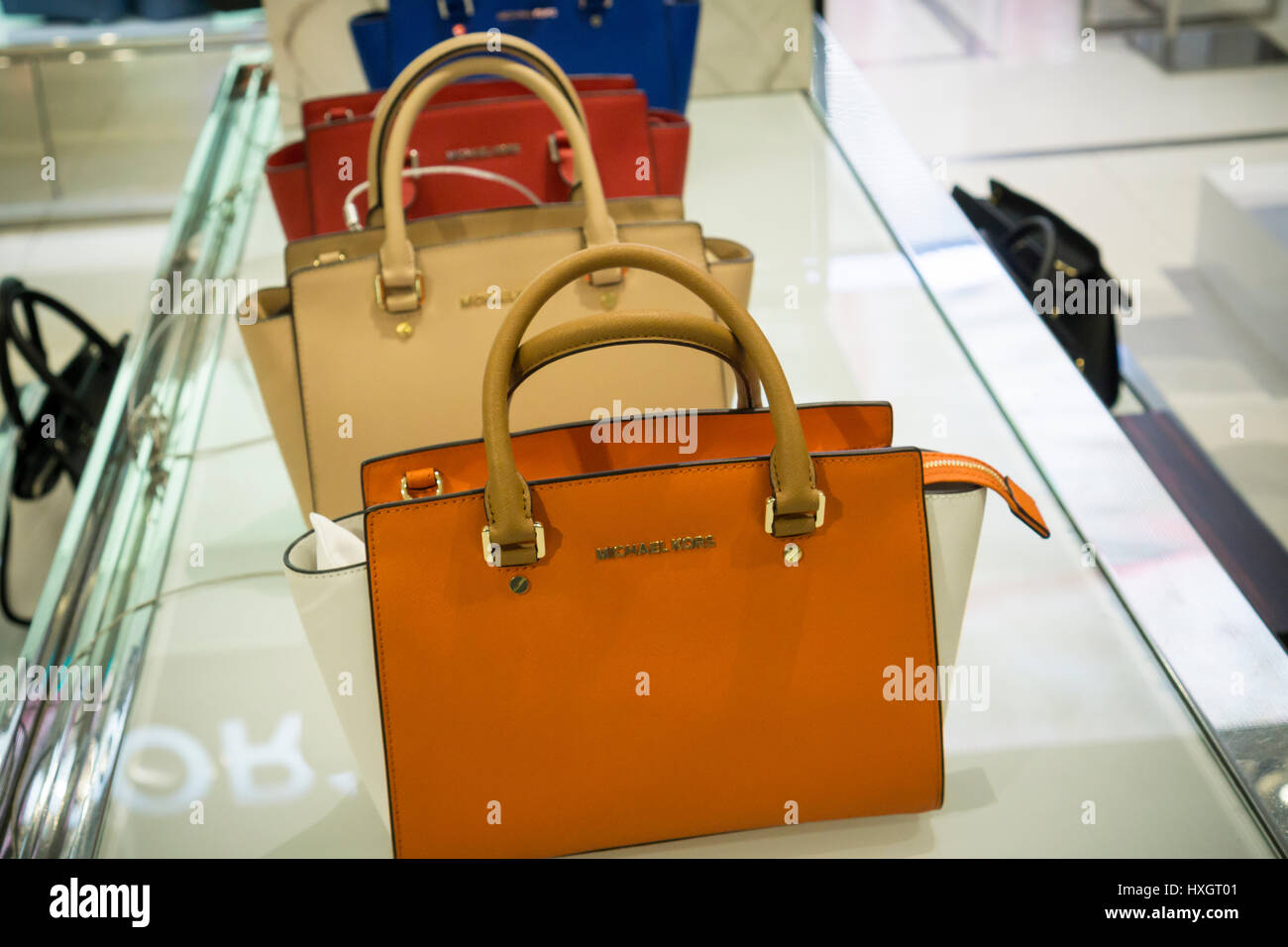 Michael Kors handbags in the Macy's Herald Square flagship store on Sunday,  March 26, 2017. (© Richard B. Levine Stock Photo - Alamy