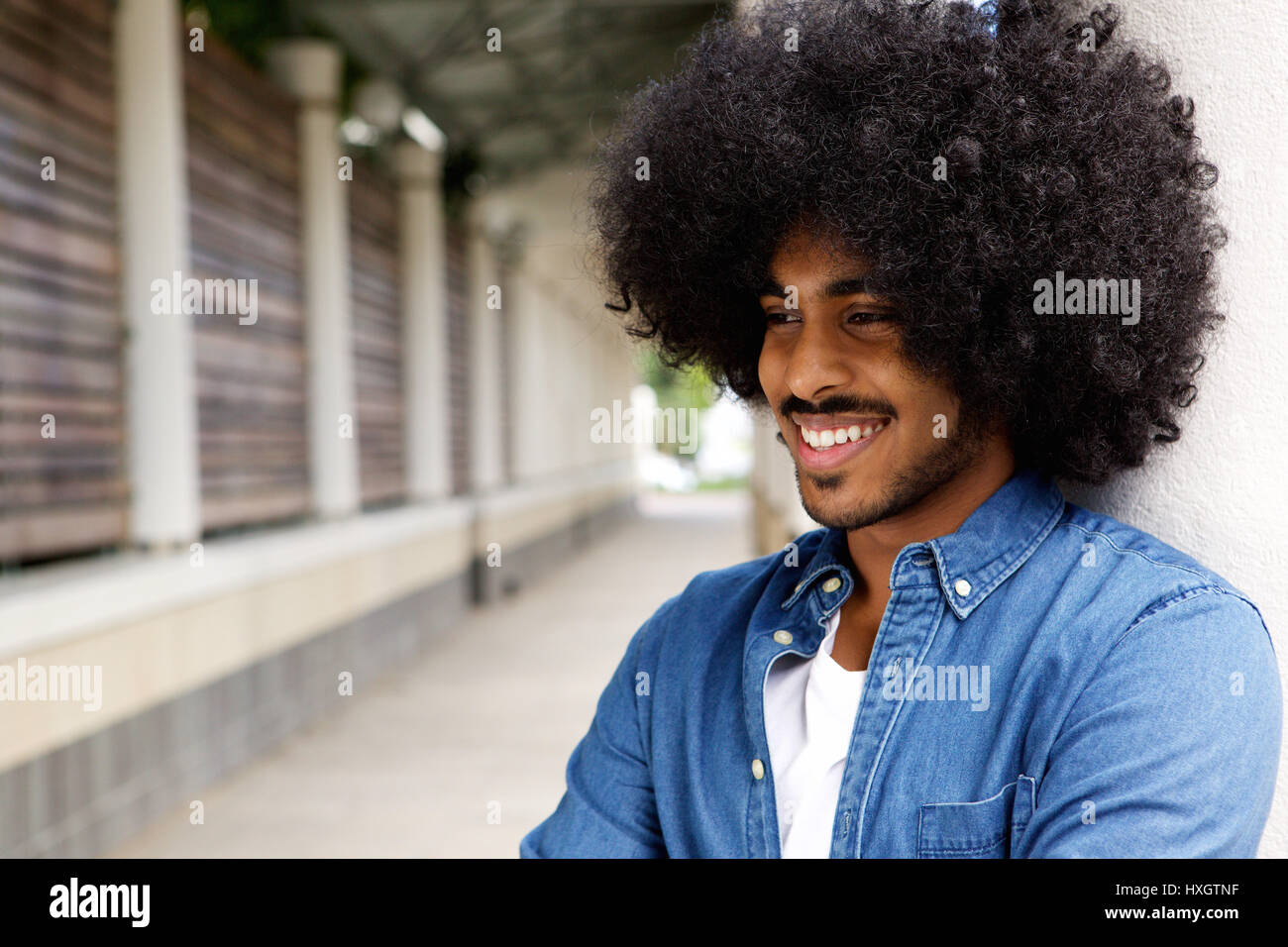 Close up portrait of a smiling african american man with afro Stock ...