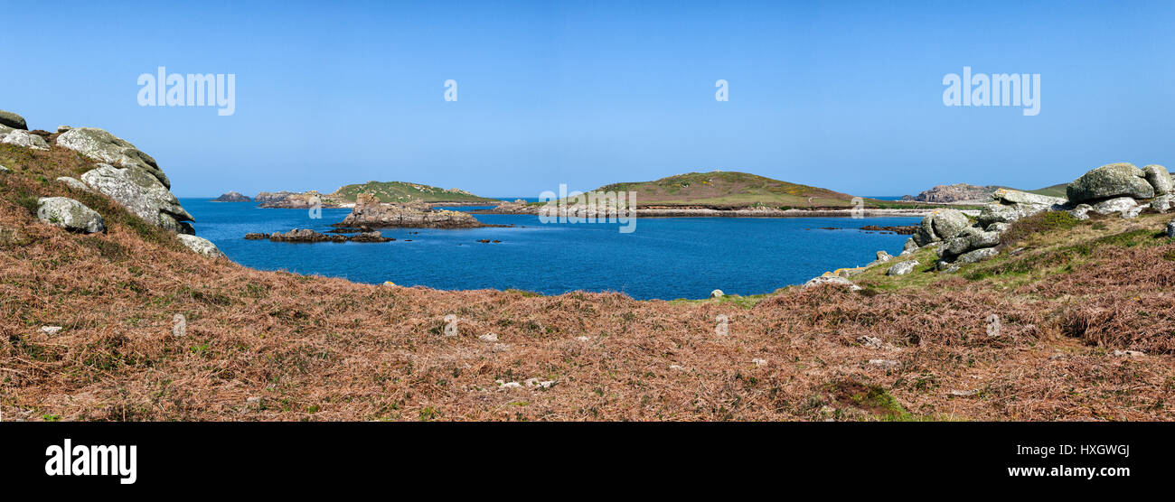 The twin rounded hills of Samson from Bryher in the Isles of Scilly UK Stock Photo