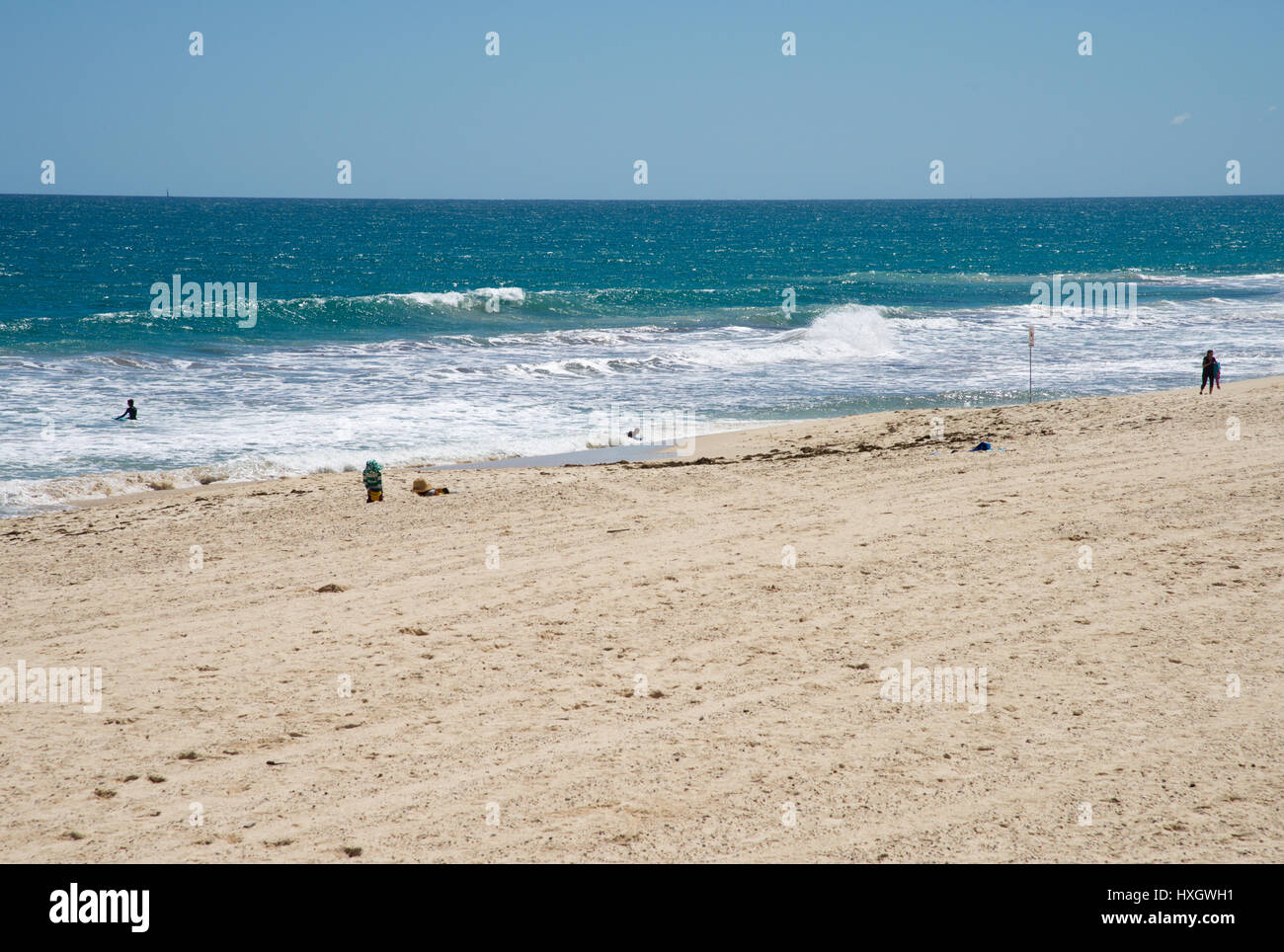 City Beach,WA,AustraliaOctober 5,2016People swimming in the Indian Ocean with sandy beach in