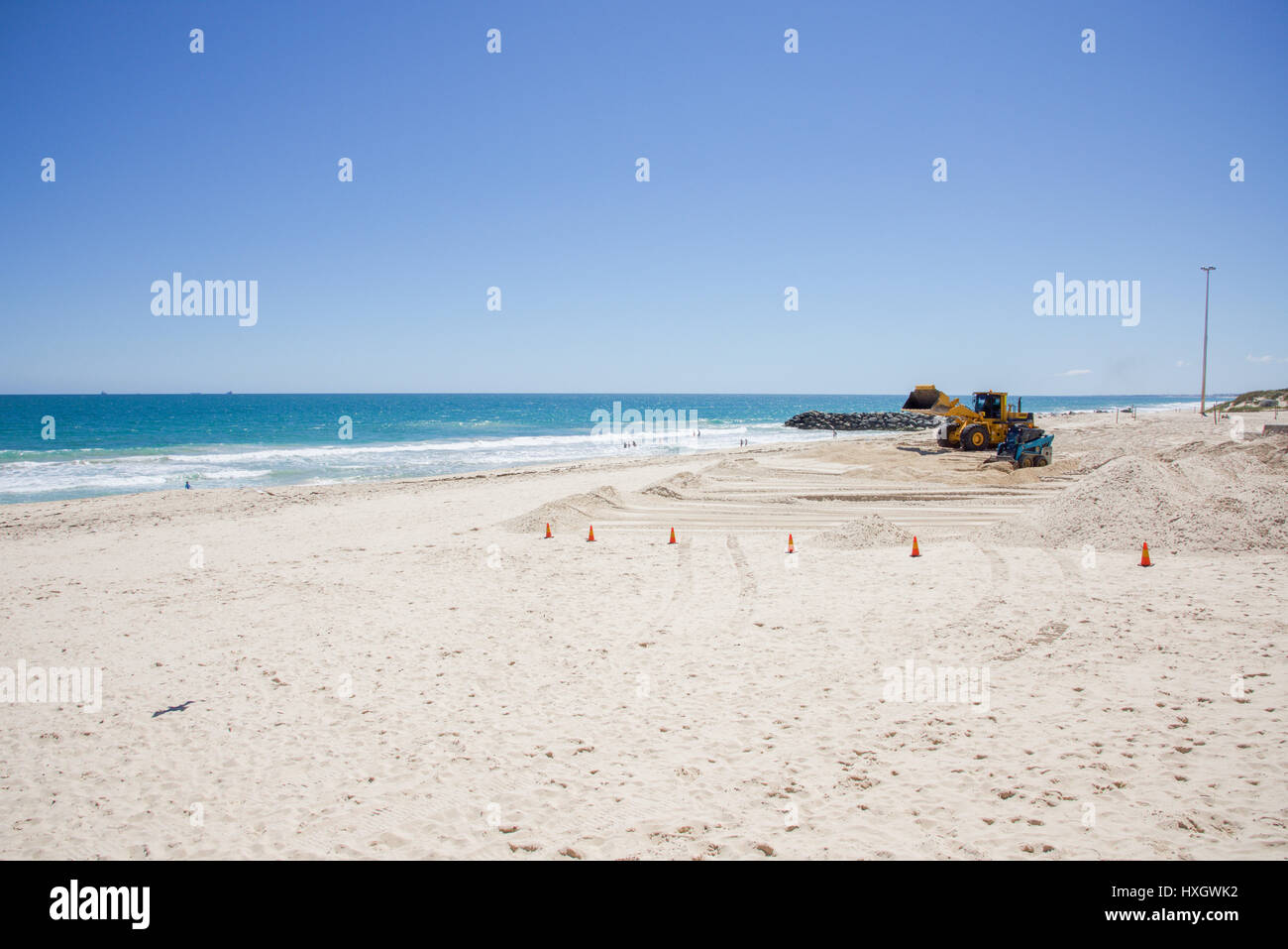 City Beach,WA,AustraliaOctober 5,2016Bulldozer moving sand on a clear day at City Beach in