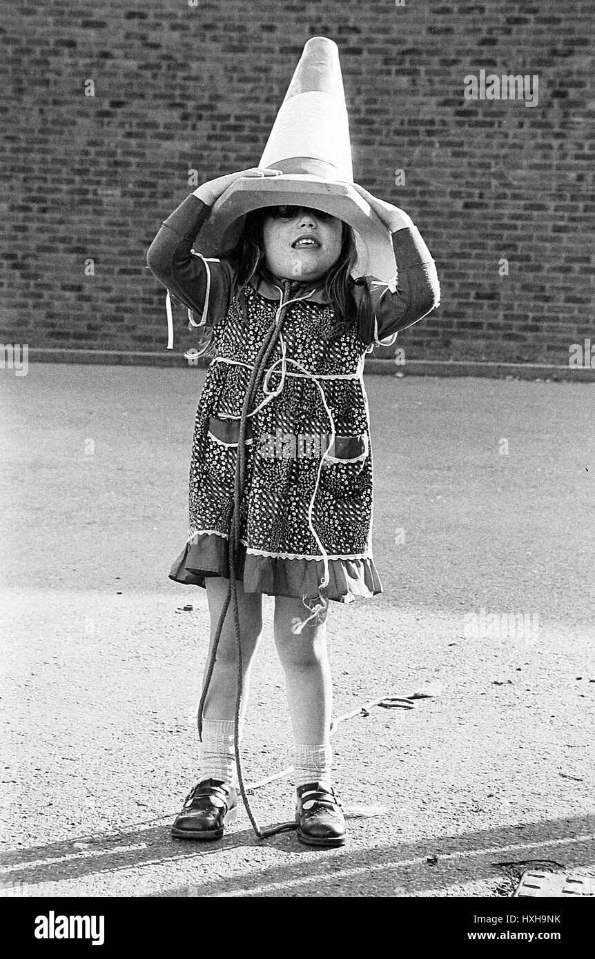 GIRL WITH TRAFFIC CONE ON HEAD ENGLAND 01 January 1970 Stock Photo Alamy