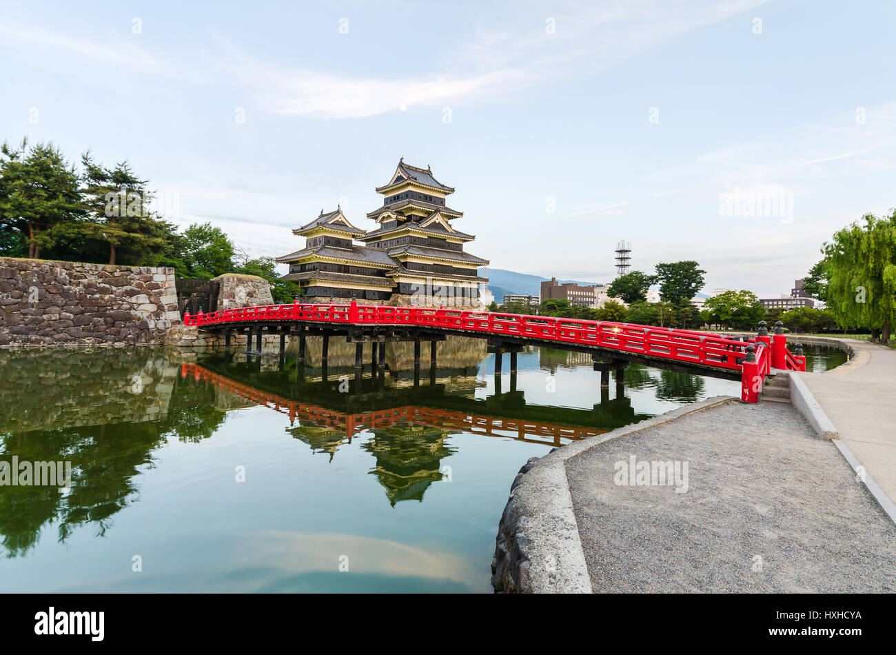 Matsumoto castle reflect on water in evening at nagano japan Stock Photo