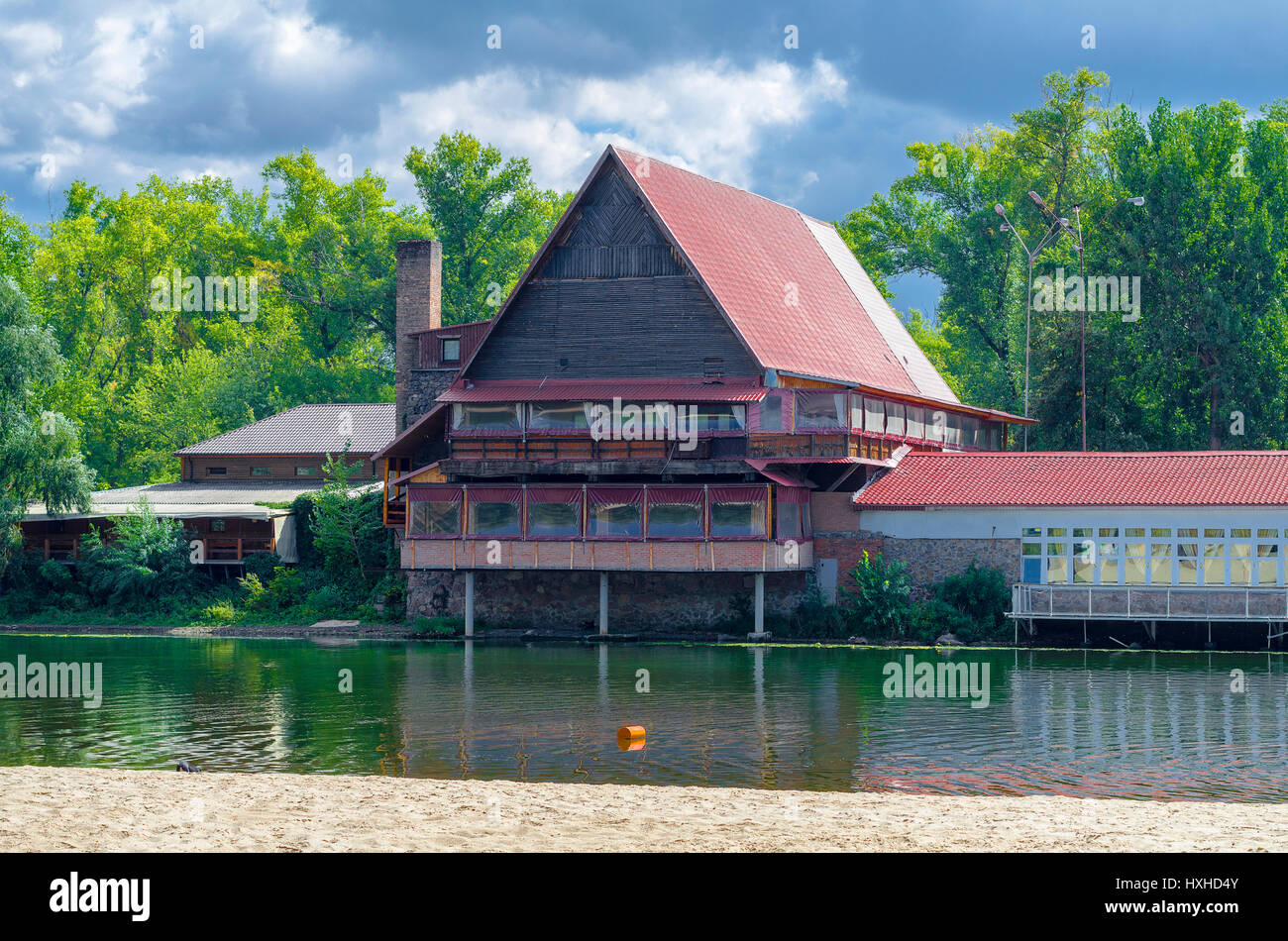Wooden house on the river Stock Photo Alamy