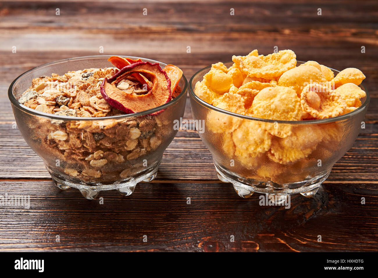 Bowls with cornflakes and muesli Stock Photo Alamy