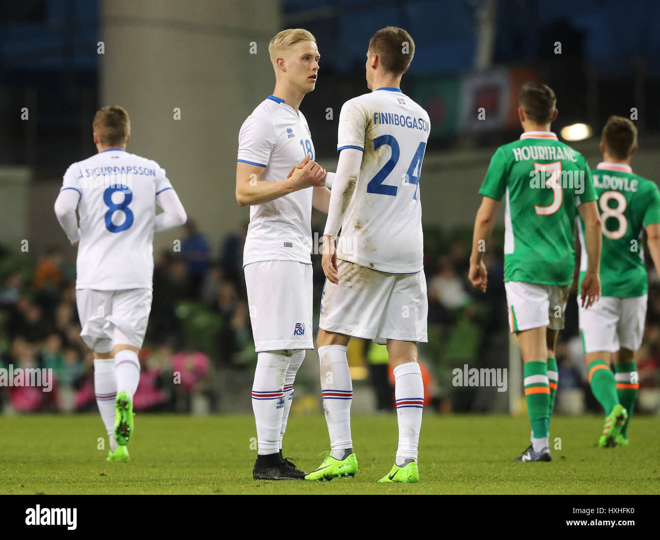 Iceland's Hodur Magnusson (left) celebrates with team-mate Alfred Finnbogason after scoring his side's first goal during the International Friendly match at the Aviva Stadium, Dublin. Stock Photo