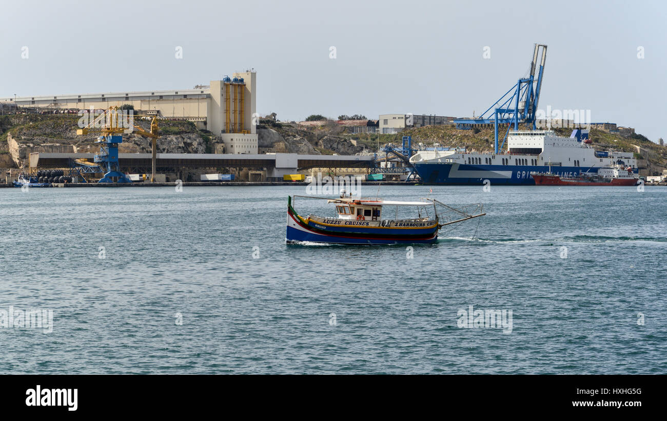 Luzzu Cruises - tourist pleasure boat - Grand Harbour, Valletta, Malta Stock Photo