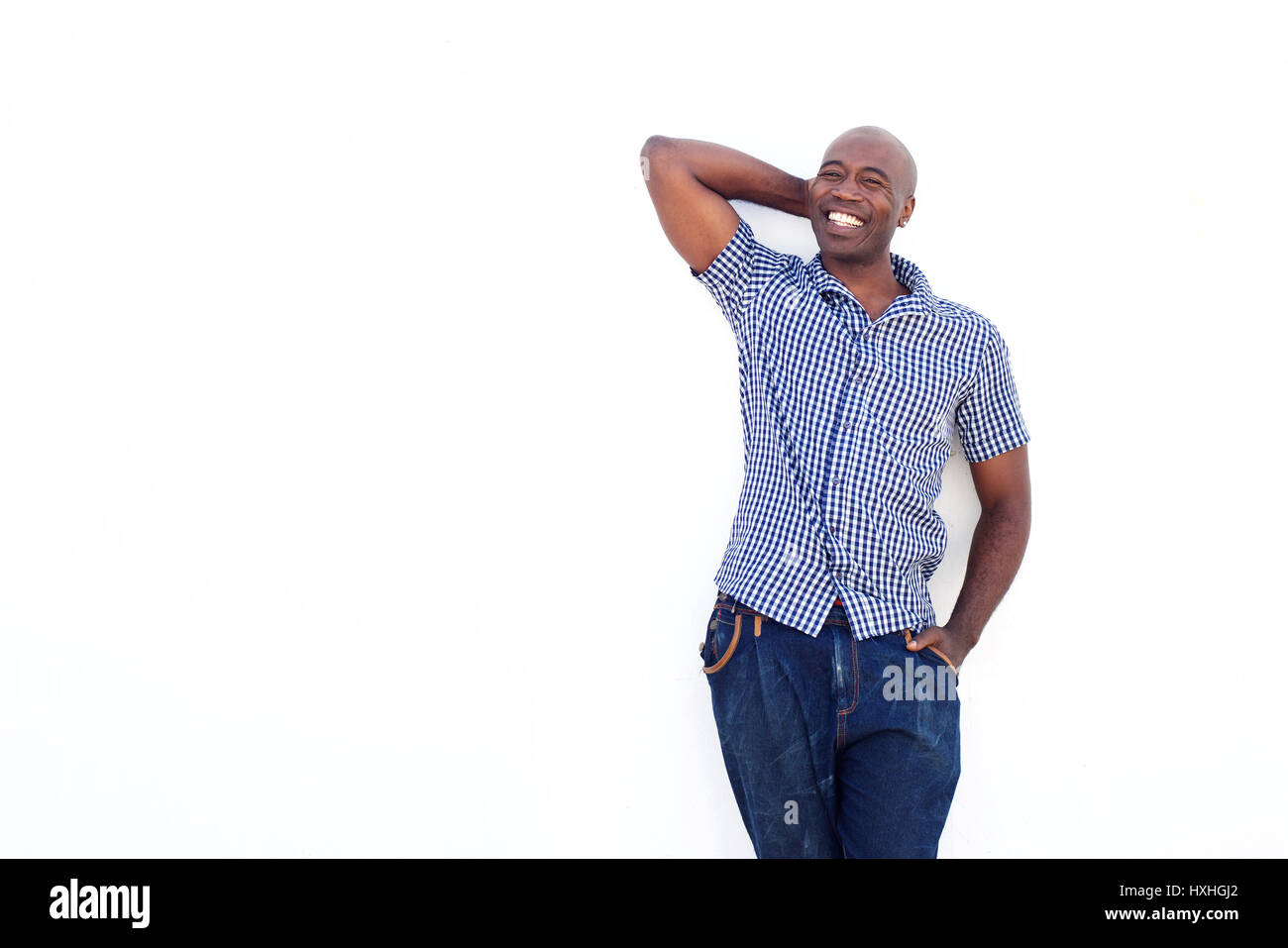 Side view portrait of african man standing over white background Stock  Photo - Alamy