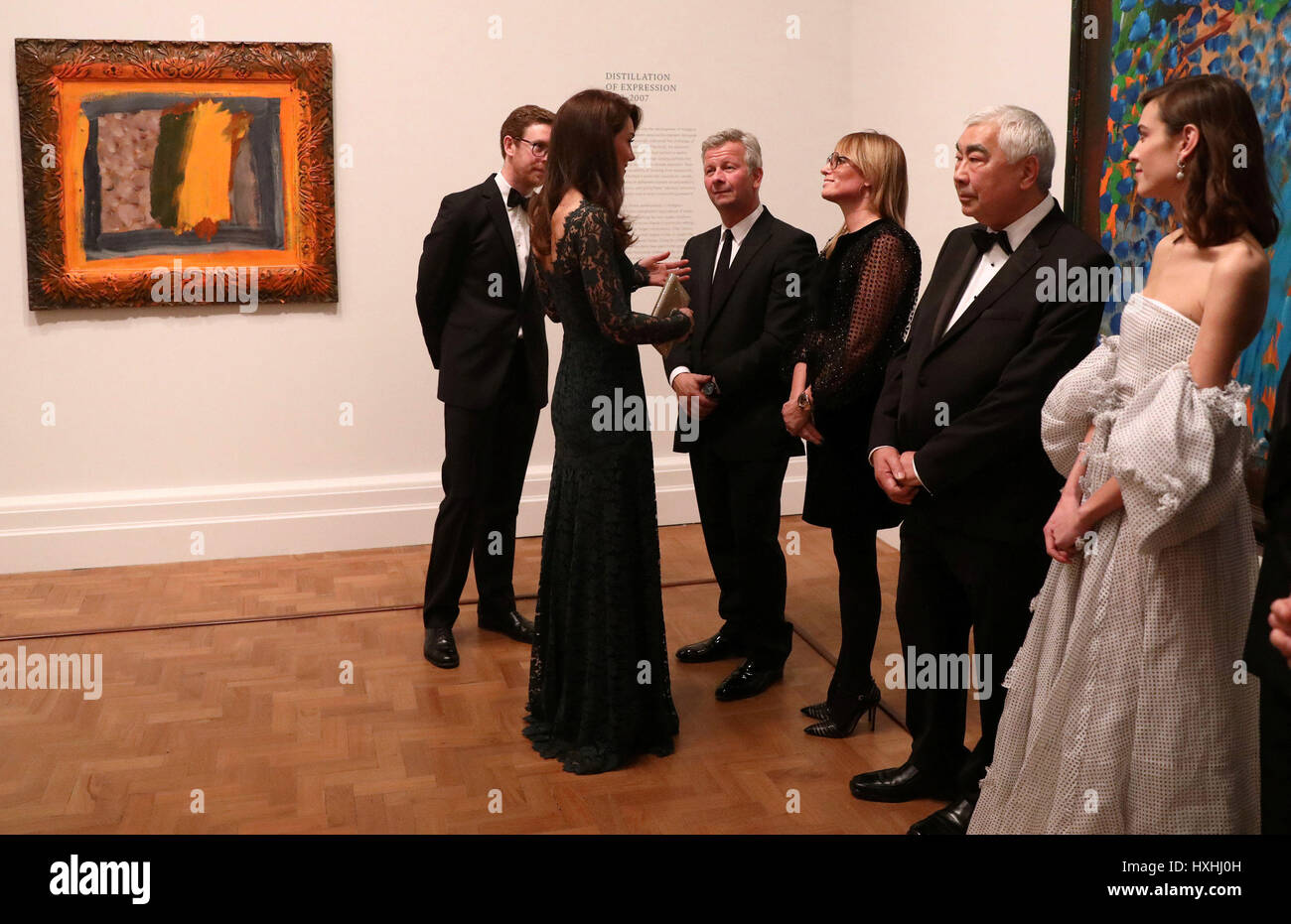 The Duchess of Cambridge speaks with Richard Found (third left) and his wife Jane Suitor (third right) at the National Portrait Gallery in London for the 2017 Portrait Gala. Stock Photo