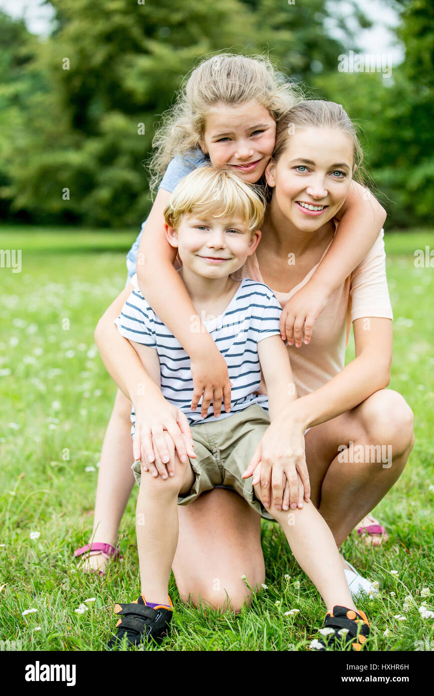 Single mom and her children as a happy family Stock Photo