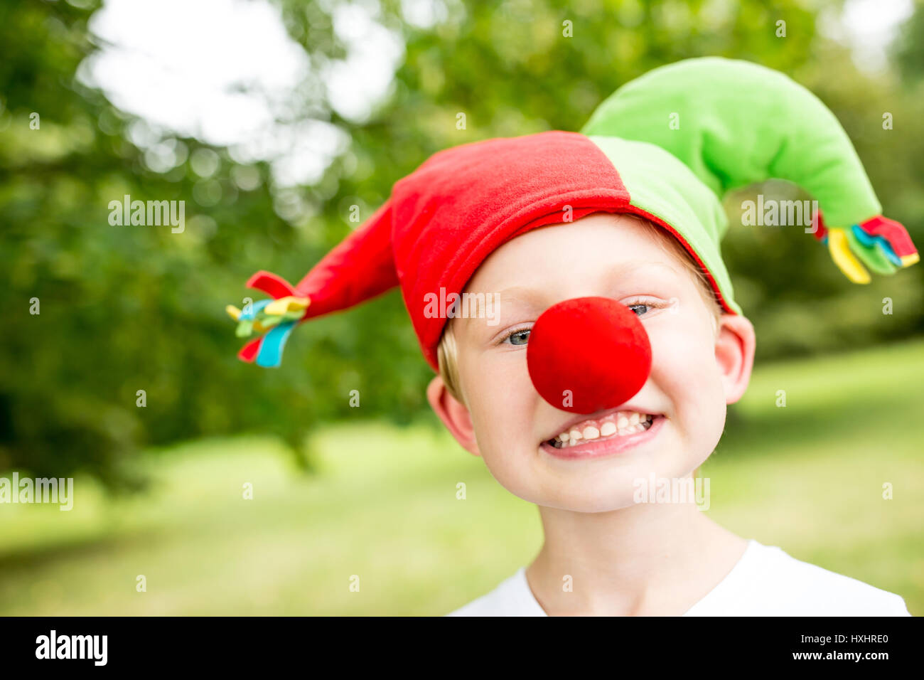 Child with carnival's costume has fun at school play Stock Photo