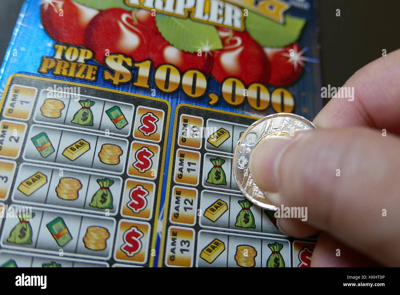 Coquitlam BC Canada November 20, 2016 Man scratching lottery ticket