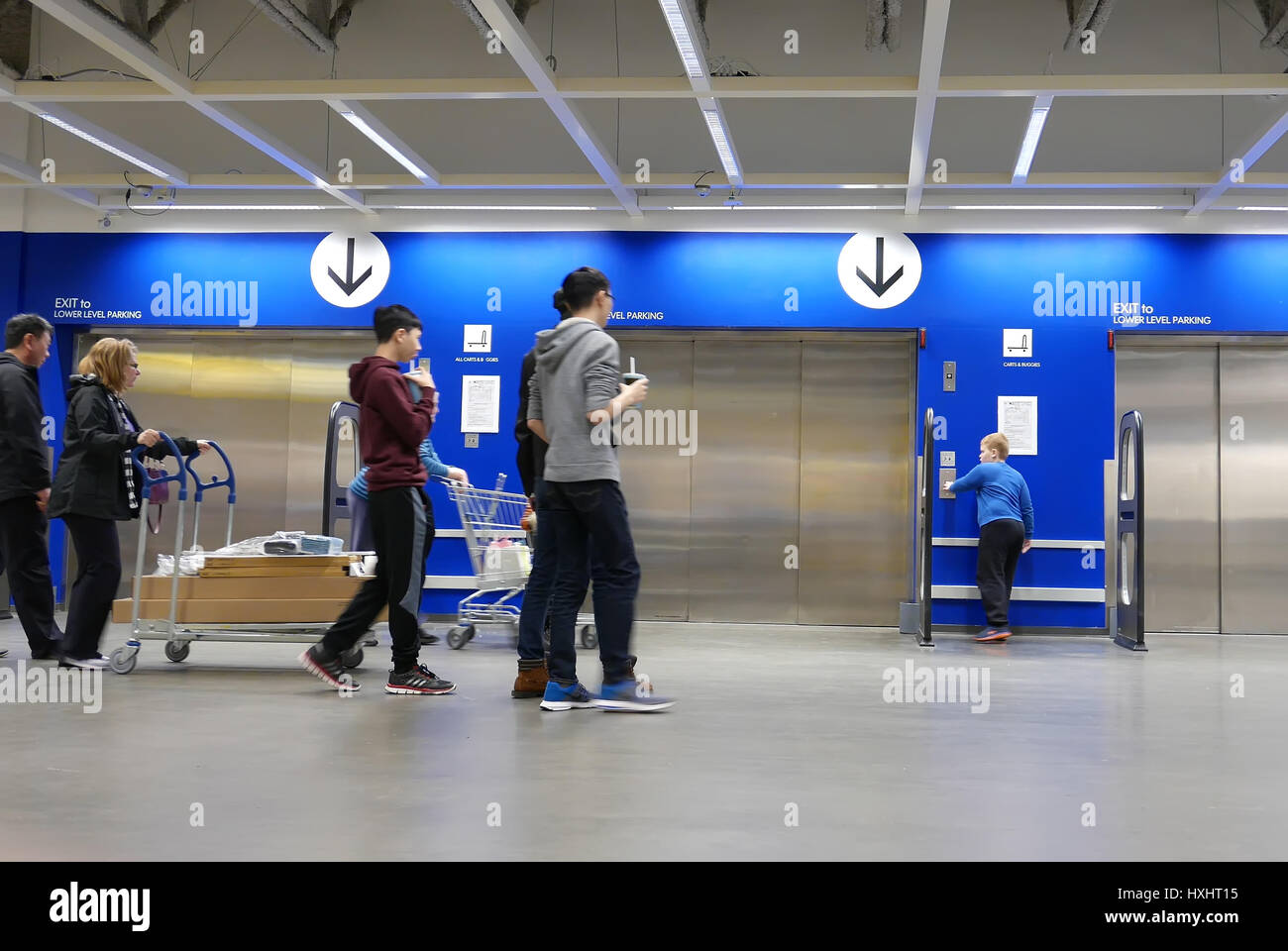 Coquitlam, BC, Canada - March 25, 2017 : Motion of people taking elevator inside Ikea store Stock Photo