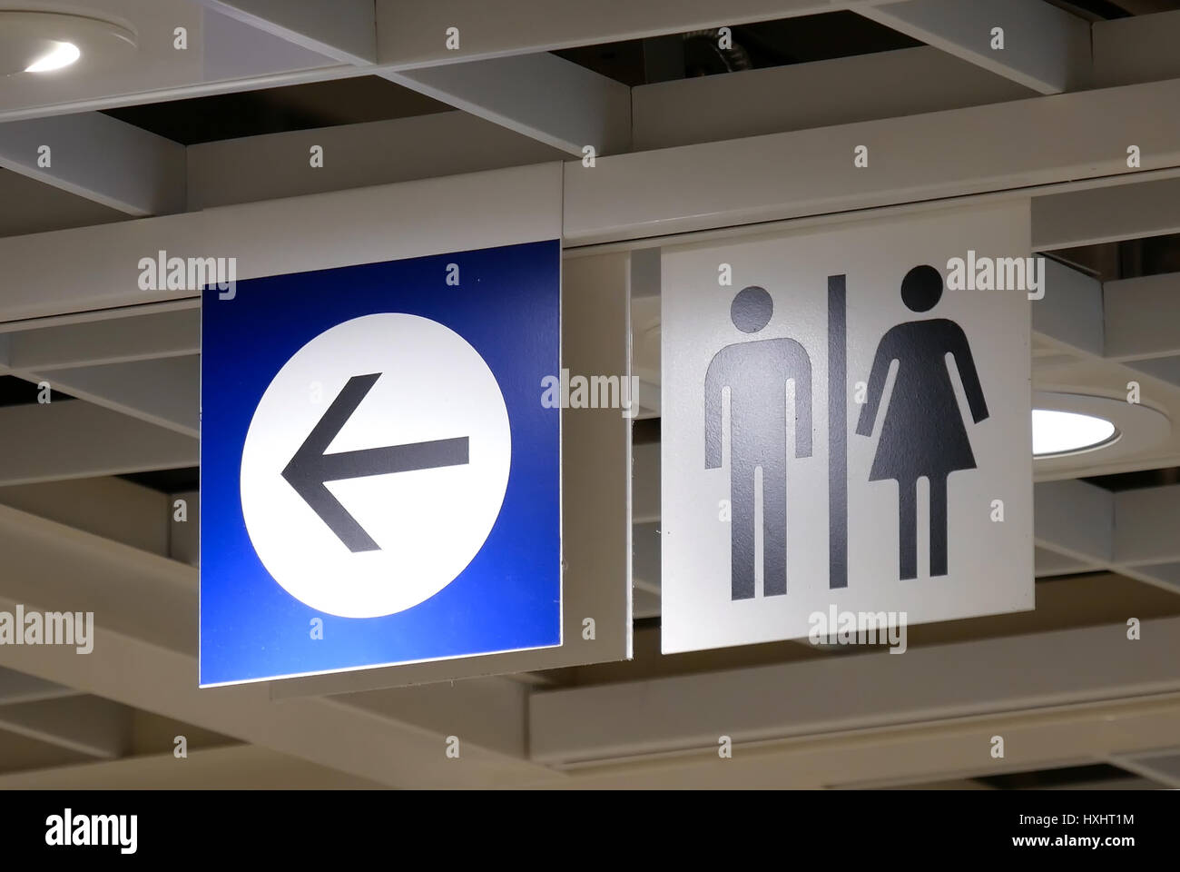 Close up man and woman washroom logo inside Ikea store Stock Photo