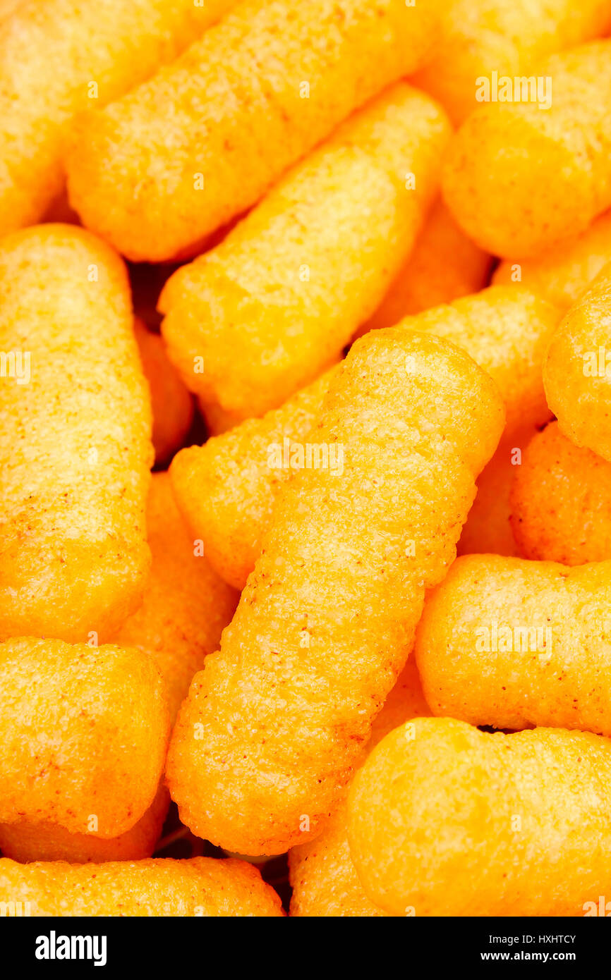 Cheese puff. Cheese puffs snack background texture food pattern Stock Photo Alamy