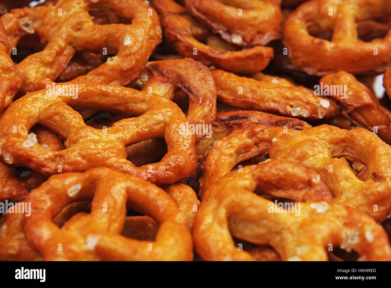 Pretzel shaped bread sticks cracker texture pattern. Salted pretzels