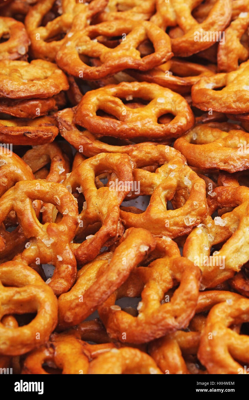 Pretzel shaped bread sticks cracker texture pattern. Salted pretzels Stock Photo Alamy
