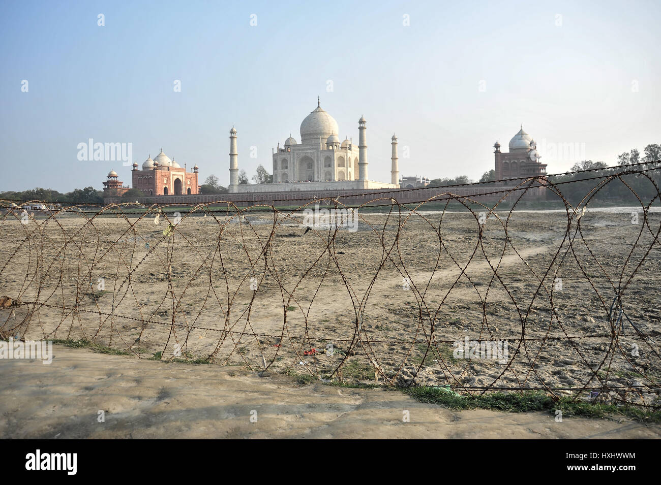 Rusted razor wire along the North bank of the Yamuna River, adjacent to the Taj Mahal Stock Photo