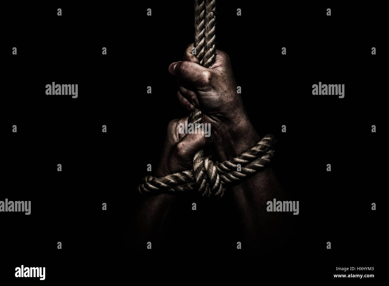 woman hands bound prisoner in room,hands bound Stock Photo