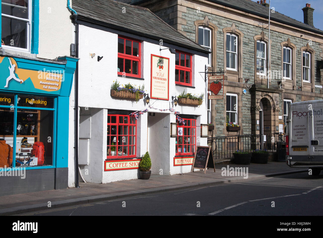 Shops cafes restaurants pubs and tells located along Main Street Keswick  near The Market Place Keswick The Lake District Cumbrai England Stock Photo