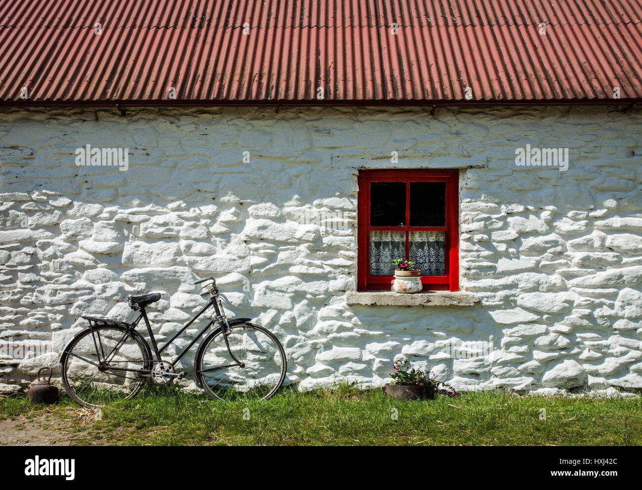 Historic site Kissane's white stone cottage Muckross House Traditional farms, farm bicycle, kitchen window, County Kerry, Ireland, FS 8.37mb. 300ppi Stock Photo