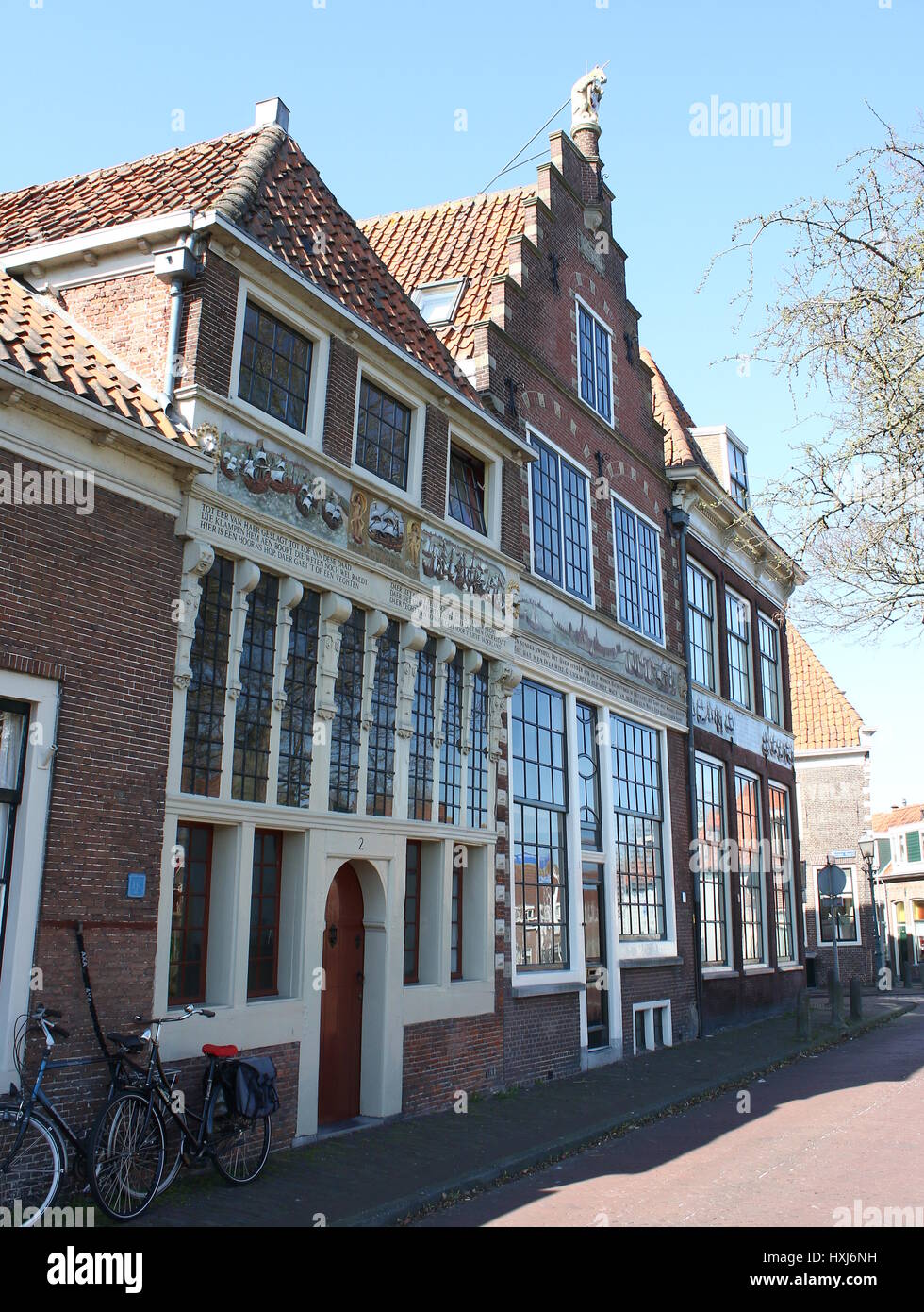 17th century Bossuhuizen (Houses of Bossu), Hoorn, Netherlands with gablestones depicting the Battle on the Zuiderzee in 1573 against the Spanish. Stock Photo