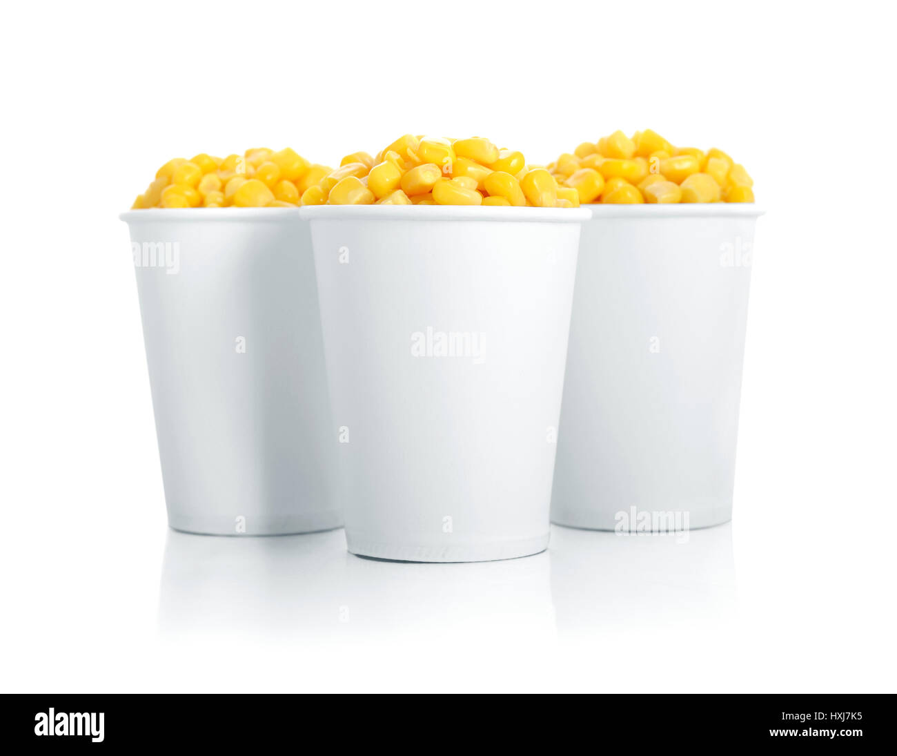 Boiled corn kernels in white paper cups isolated on white Stock Photo Alamy