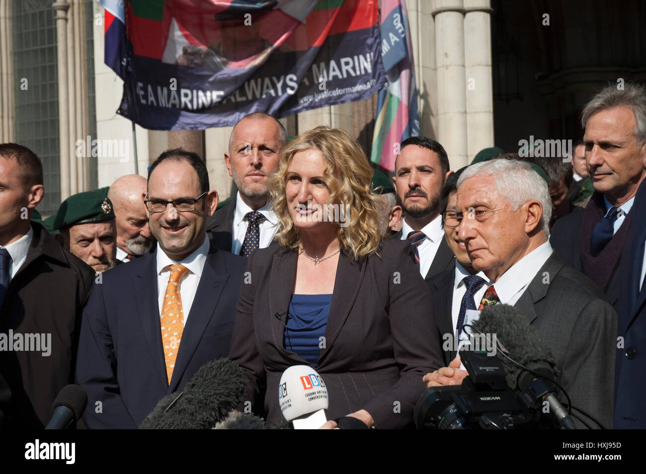 London, UK. 28th Mar, 2017. Supporters of marine Alexander Blackman. Claire Blackman wife of marine Alexander Blackman after his sentence at Royal Court. Credit: JOHNNY ARMSTEAD/Alamy Live News Stock Photo