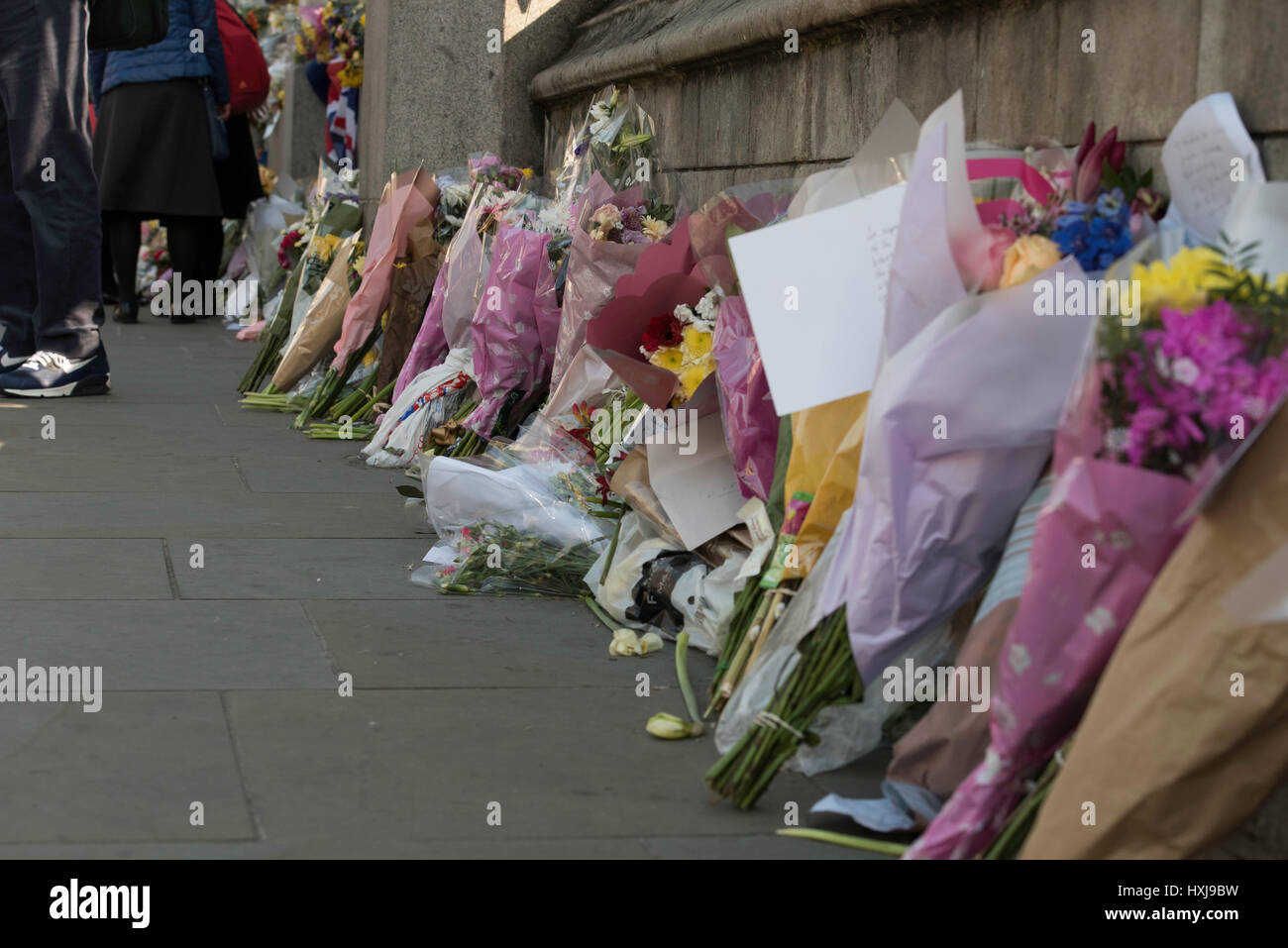 London, UK. 28th March 2017. Floral tributes outside the House of Commons following the Terror attack Credit: Ian Davidson/Alamy Live News Stock Photo
