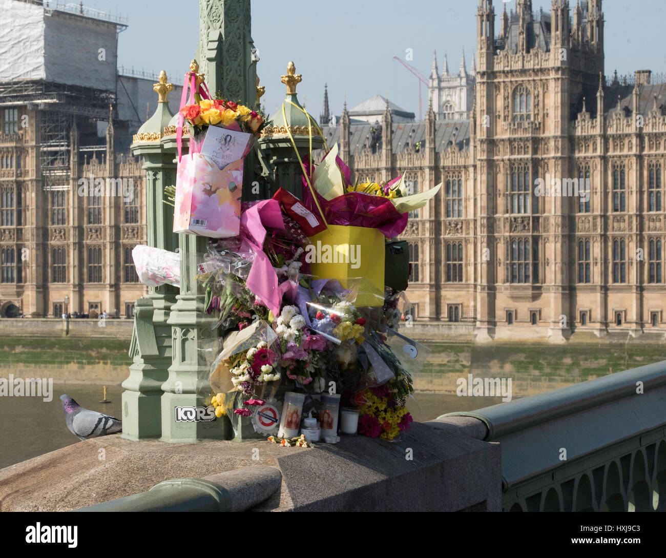 London, UK. 28th March 2017. Floral tributes on Westminster Bridge, following the Terror attack Credit: Ian Davidson/Alamy Live News Stock Photo