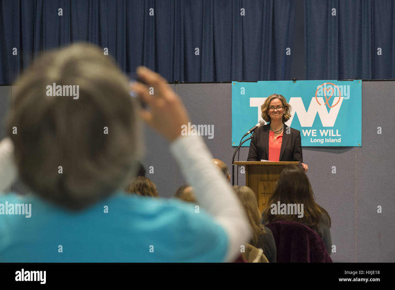 Wyandanch, New York, USA. 26th Mar, 2017. At podium, LAURA CURRAN, Nassau County Legislator (Dem