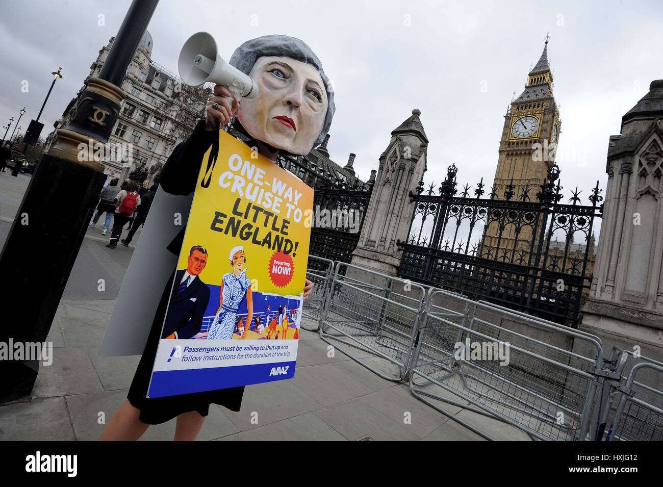Protester dressed at Prime Minister Theresa May at Parliament after the triggering of Article 50, Westminster, London, UK Credit: Finnbarr Webster/Alamy Live News Stock Photo