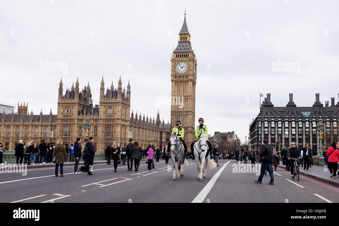 London, UK. 29th Mar, 2017. Westminster Bridge is closed to traffic and security is tight before a minutes silence in memory of those who died in the attack by Khalid Masood a week ago . It was exactly a week ago when Khalid Masood killed four people on the bridge and outside the Houses of Parliament in London Credit: Simon Dack/Alamy Live News Stock Photo