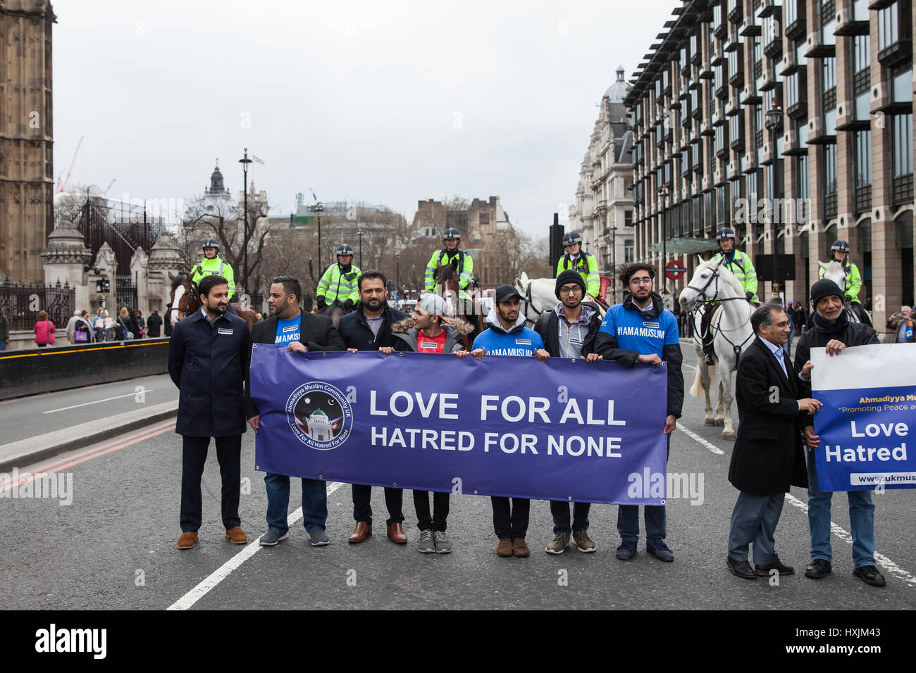 London, UK. 29th March, 2017. Members of the Muslim community on Westminster Bridge during a tribute by the Metropolitan Police and faith leaders to the victims of last week's attack in Westminster. Credit: Mark Kerrison/Alamy Live News Stock Photo