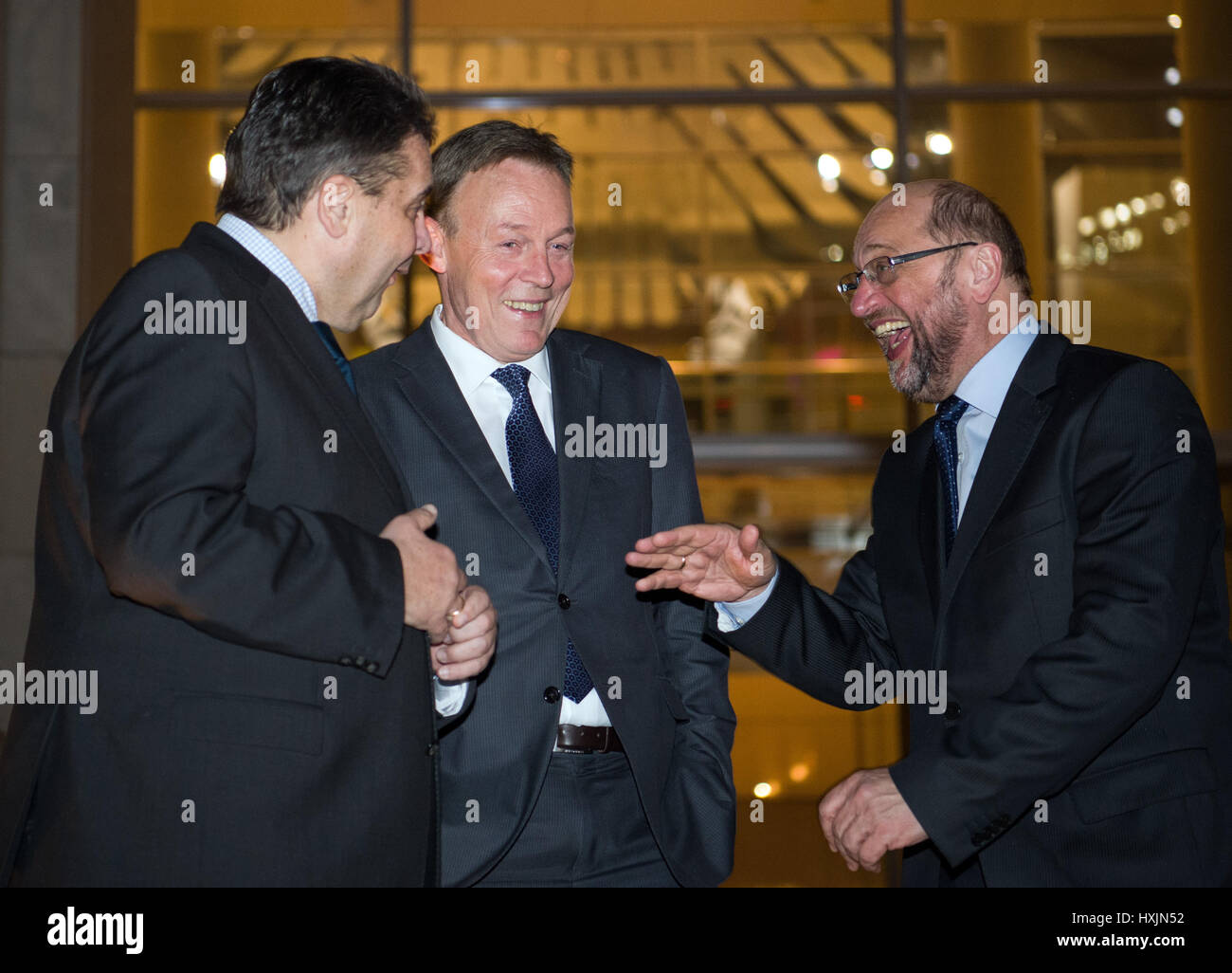 Berlin, Germany. 29th Mar, 2017. (L-R) German Foreign Minister Sigmar Gabriel, candidate for the German Chancellorship, Martin Schulz, and faction leader, Thomas Oppermann, after the spring reception of the SPD (Social Democratic Party of Germany) parliamentary group in Berlin, Germany, 29 March 2017. Photo: Soeren Stache/dpa/Alamy Live News Stock Photo