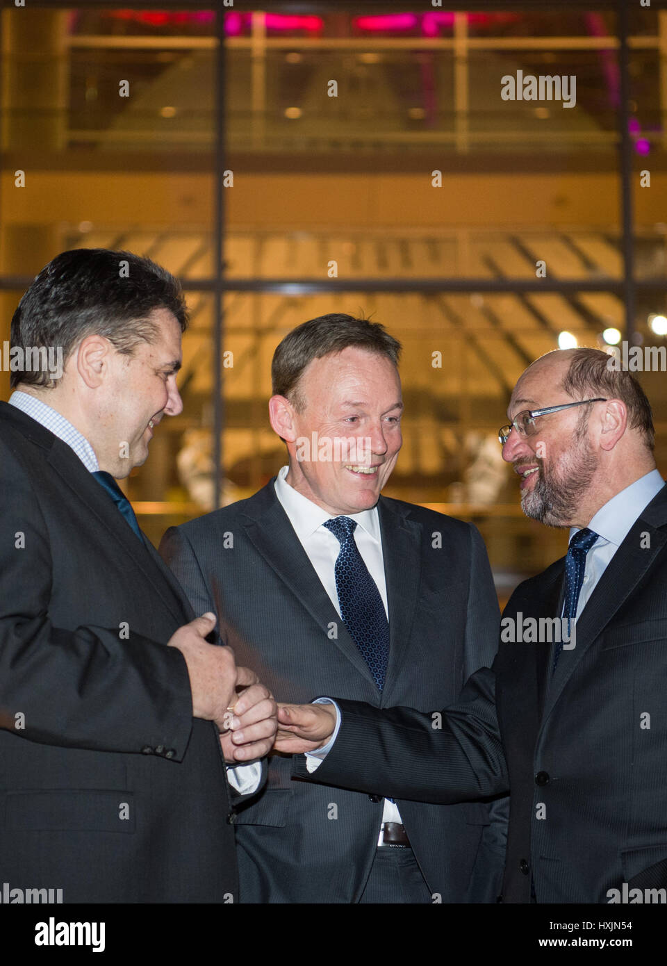 Berlin, Germany. 29th Mar, 2017. (L-R) German Foreign Minister Sigmar Gabriel, candidate for the German Chancellorship, Martin Schulz, and faction leader, Thomas Oppermann, after the spring reception of the SPD (Social Democratic Party of Germany) parliamentary group in Berlin, Germany, 29 March 2017. Photo: Soeren Stache/dpa/Alamy Live News Stock Photo