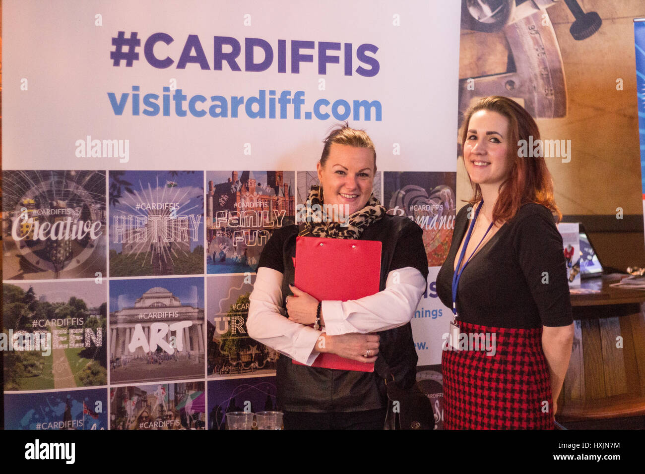 Melissa Knight Willis and Samantha Ellis representing Cardiff tourism. Stall holders at the Cardiff Bierkeller Business Expo for local businesses in the city centre. hashtagCardiffis by Ella Geen Stock Photo