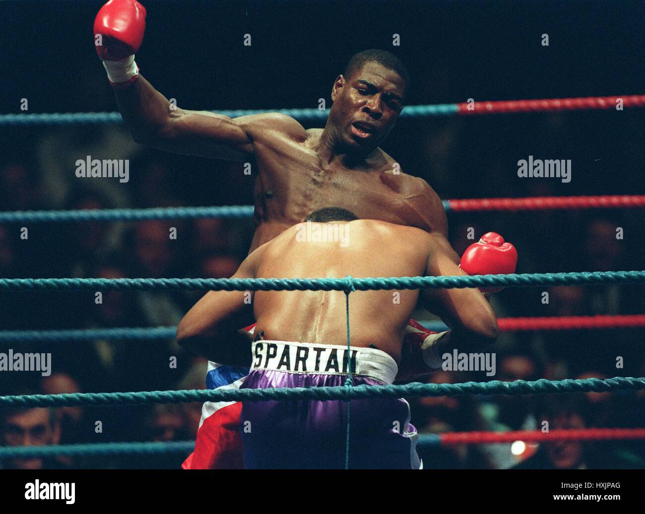 FRANK BRUNO WAGES WAR ON JESSE FERGUSON (NEC MARCH 94) 30 March 1994 Stock Photo