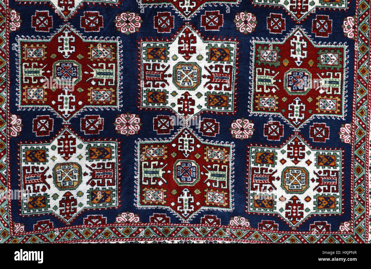 Folk Pattern Rug Hand-woven carpet with ethnic and folk pattern Stock Photo - Alamy