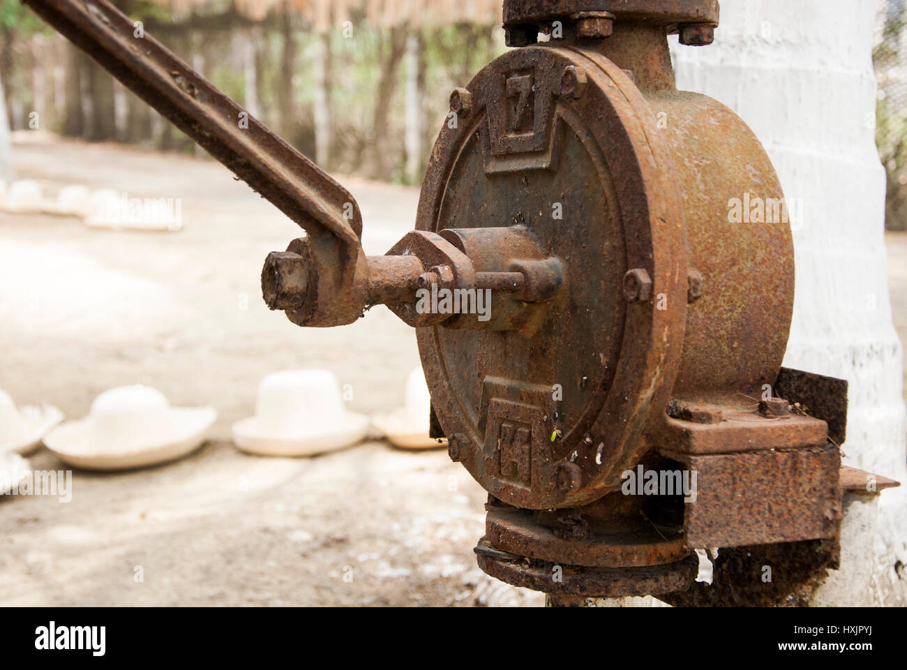 Old fashion outdoor well hand water pump Stock Photo - Alamy